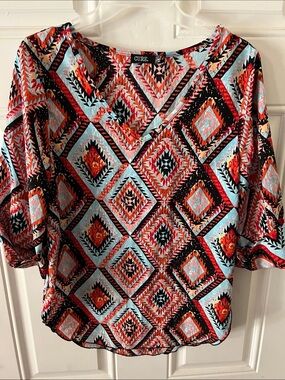 CURE Women's Red & Light Blue Geometric V-Neck Blouse